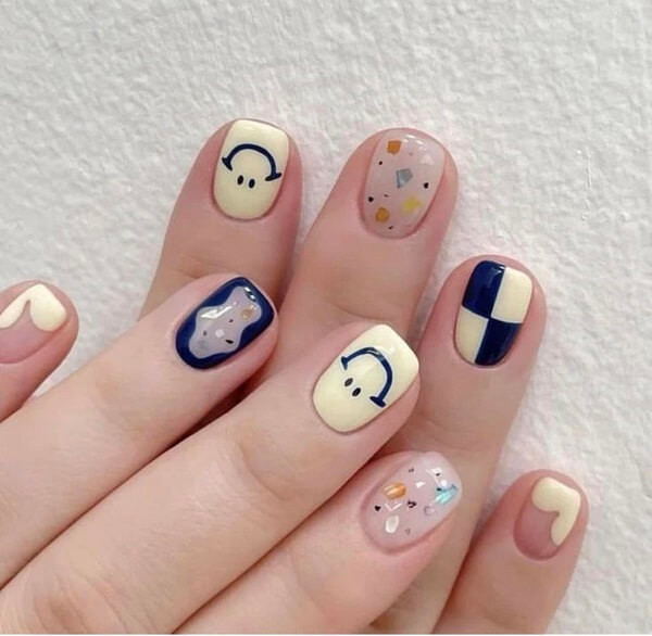 alt: Mẫu nail cute đính đá và charm