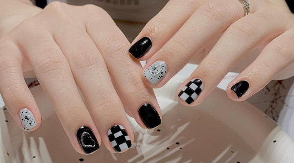 alt Mẫu nail đen trắng cá tính với họa tiết da báo